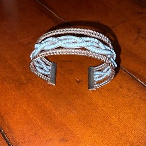 Silver plated bangle bracelet With blue beads.